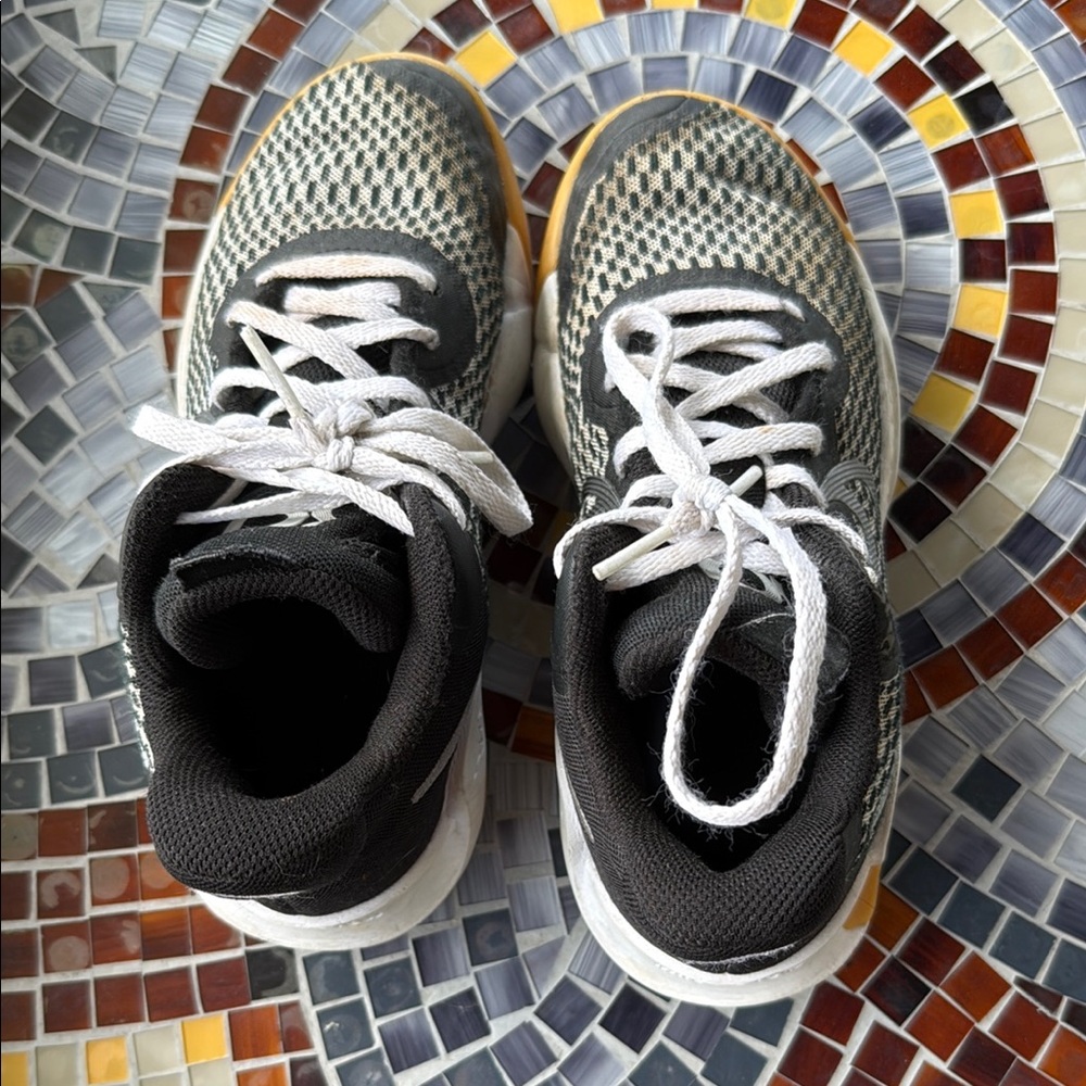 Nike Kids' Sneakers in Black, White, and Gold